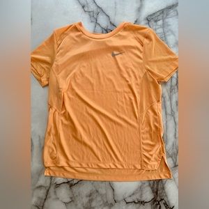 Nike Training One Dri-FIT standard fit short sleeve t-shirt in orange